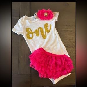 Pink tutu bloomers, onesie and headband.